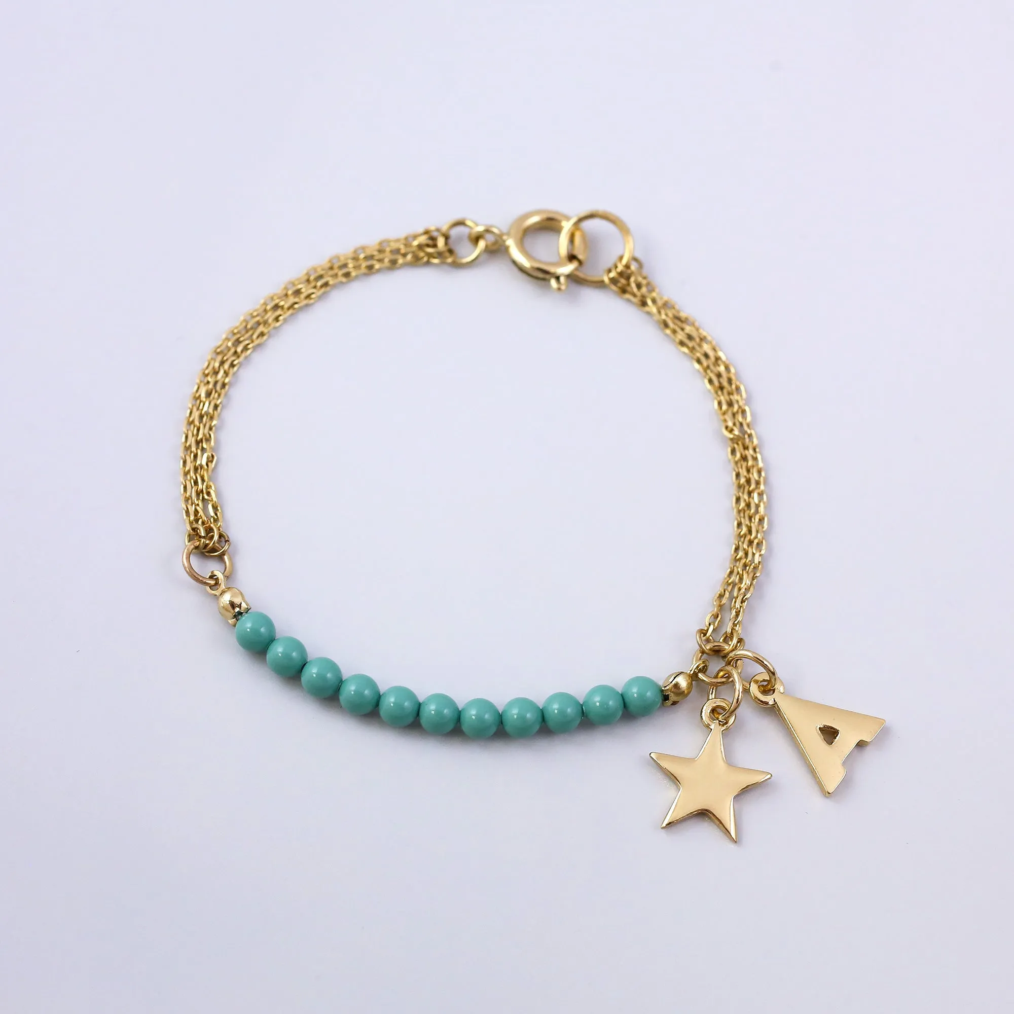 Personalised Gold Charm Bracelet Made with Pearls from Swarovski ®